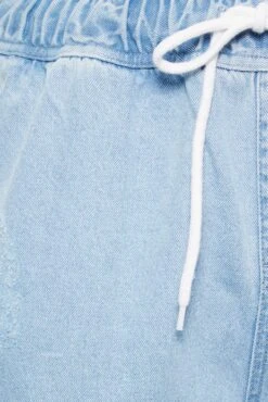 YOURS Curve Bleach Blue Ripped Jogger Jeans 7 YOURS Curve Bleach Blue Ripped Jogger Jeans -Saga Dresses Shop 0c6f4e49 956f 4c 143242 Z