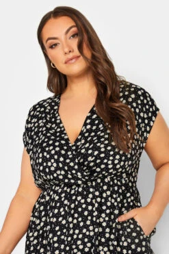 YOURS Curve Black Daisy Print High Low Wrap Dress 8 YOURS Curve Black Daisy Print High Low Wrap Dress -Saga Dresses Shop 0e0ca9e7 d607 41 137469 D