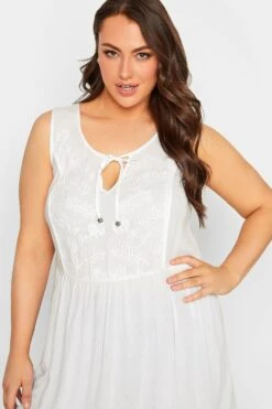 YOURS Curve White Embroidered Peplum Vest Top -Saga Dresses Shop 57ee66a5 ac4b 49 131847 D