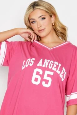 YOURS Curve Hot Pink 'Los Angeles' Slogan Varsity T-Shirt -Saga Dresses Shop 58056357 3d73 45 320910 D
