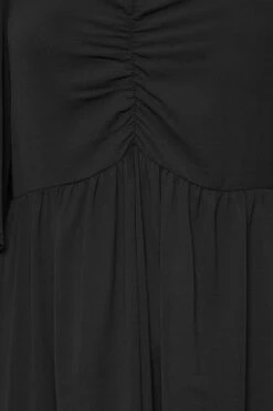 LIMITED COLLECTION Curve Black Ruched Angel Sleeve Dress 9 LIMITED COLLECTION Curve Black Ruched Angel Sleeve Dress -Saga Dresses Shop 5ad69956 ab56 4d 214535 Z