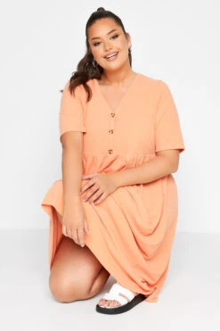 LIMITED COLLECTION Curve Light Orange Ribbed Peplum Midi Dress 8 LIMITED COLLECTION Curve Light Orange Ribbed Peplum Midi Dress -Saga Dresses Shop 88459b38 6a4b 4e 214631 D