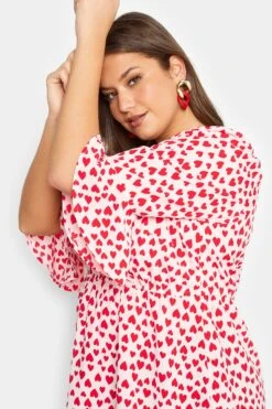 YOURS LONDON Curve Pink Heart Ruffle Sleeve Wrap Top -Saga Dresses Shop 90c0dc04 9332 42 161961 D