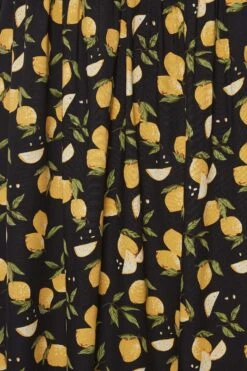 LIMITED COLLECTION Curve Black Lemons Print Frill Maxi Dress 9 LIMITED COLLECTION Curve Black Lemons Print Frill Maxi Dress -Saga Dresses Shop dca5eb2f 5b38 4a 215682 Z